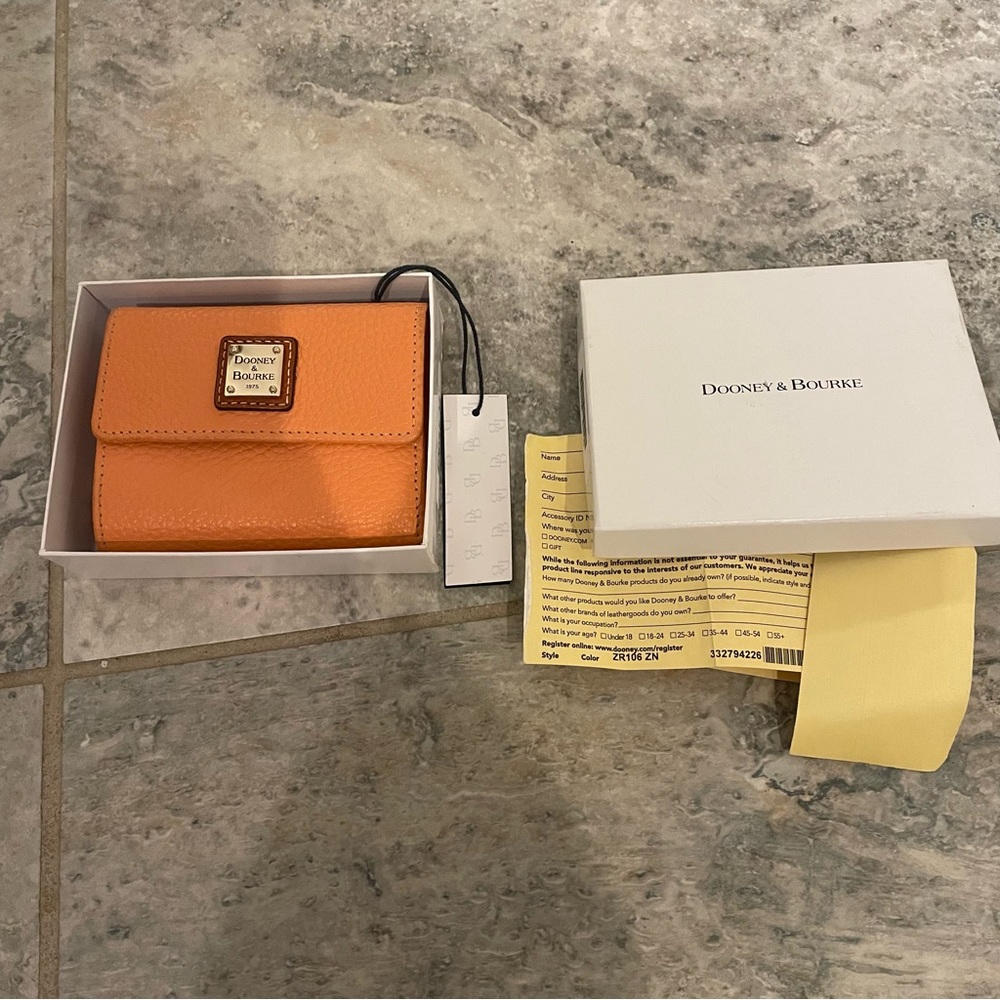 Apricot Dooney pebble leather flap wallet